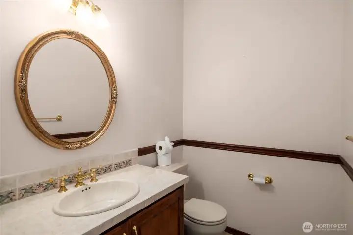Main Level Half Bath near Den