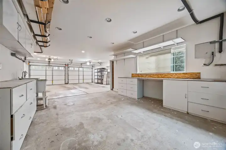 3 car garage, tandem area can also be a shop space