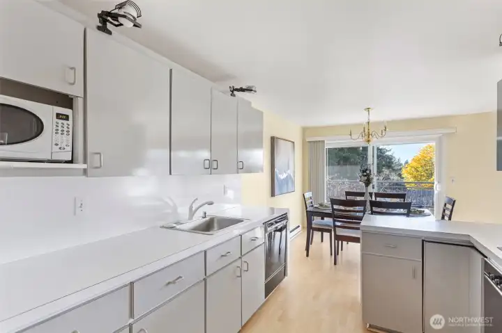 Complete with waterfall laminate countertop edges and retro appliances