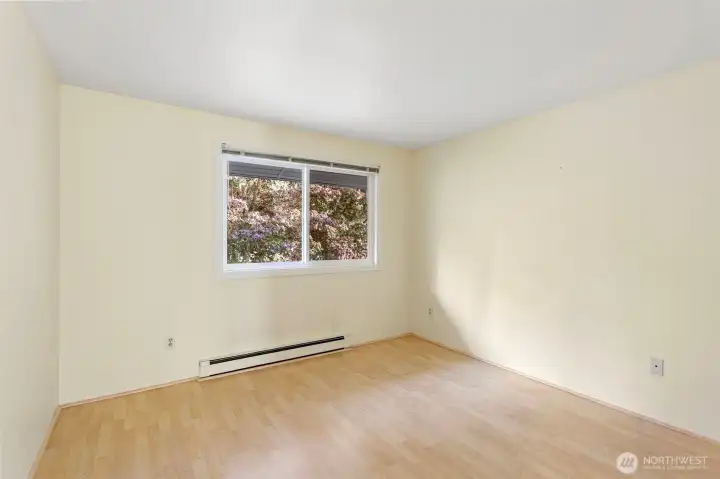 Bedroom #3 looking east, with sliding double door closet