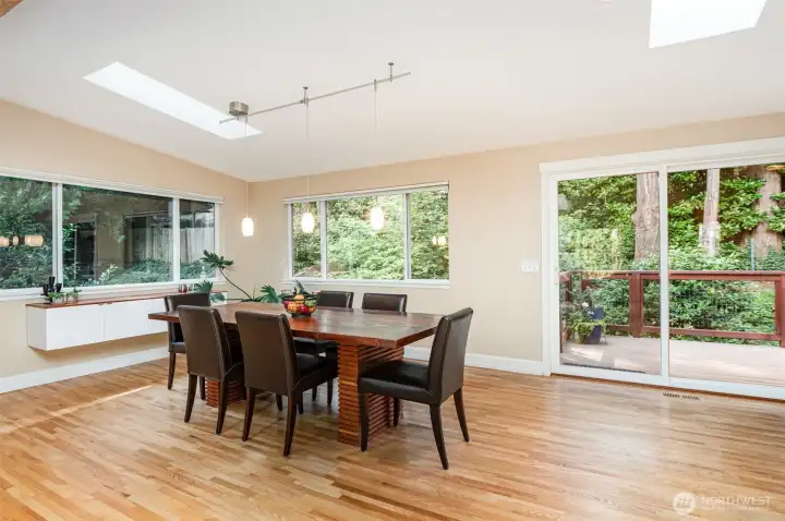 Massive dining area with built in buffet cabinet and slider to back deck.