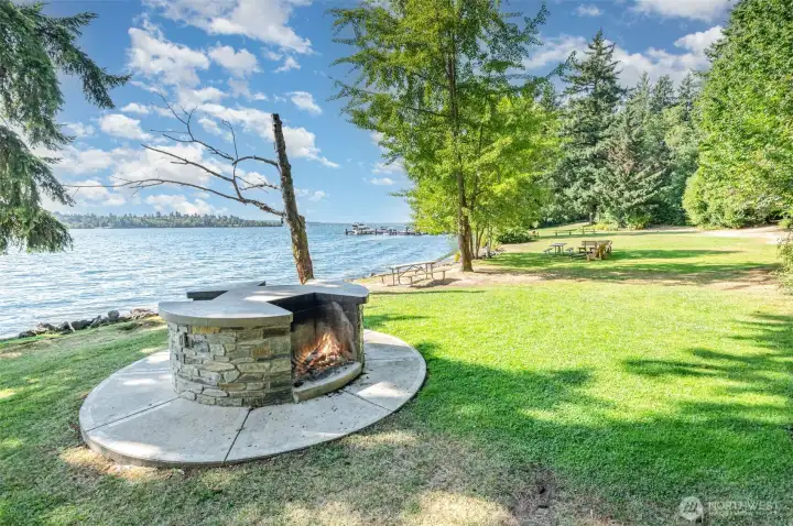 One of several fire pits and picnic areas along the 1100' of co-ownership Lake WA waterfront for Beaux Arts residents.