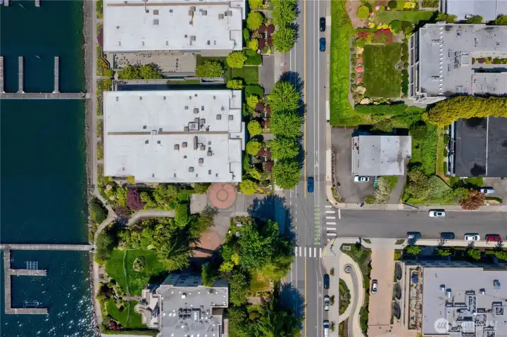 Surrounded by luxury buildings and manicured landscape.