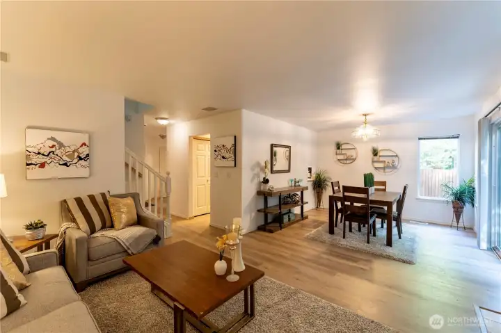 Living space and formal dining with lots of natural light.