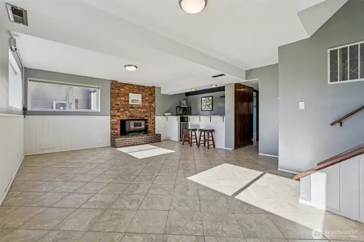 Back downstairs faetures a spacious wreck room/entertainment space.