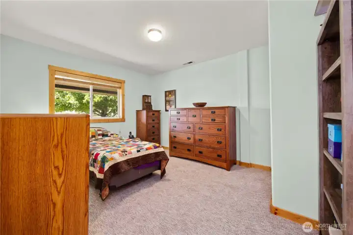 Third of the four bedrooms.