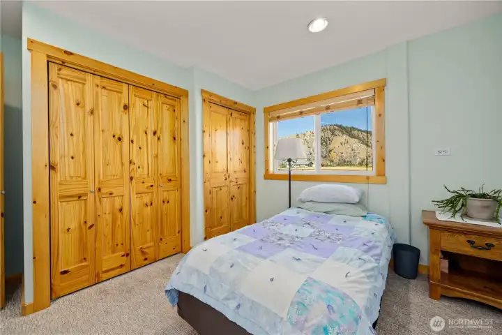 Fourth of the four bedrooms....note the large closet spaces.