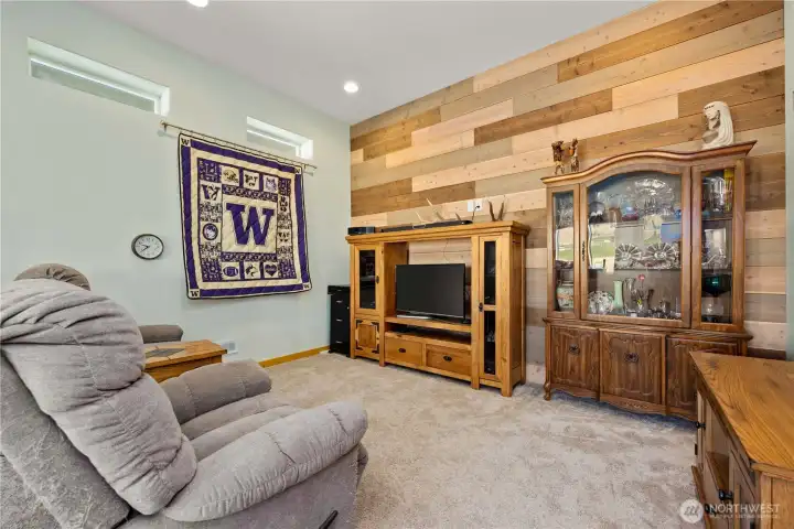 The next room down the hallway is a wonderful surprise! Call it an escape, call it a retreat, the previous owner called it his "man cave"!