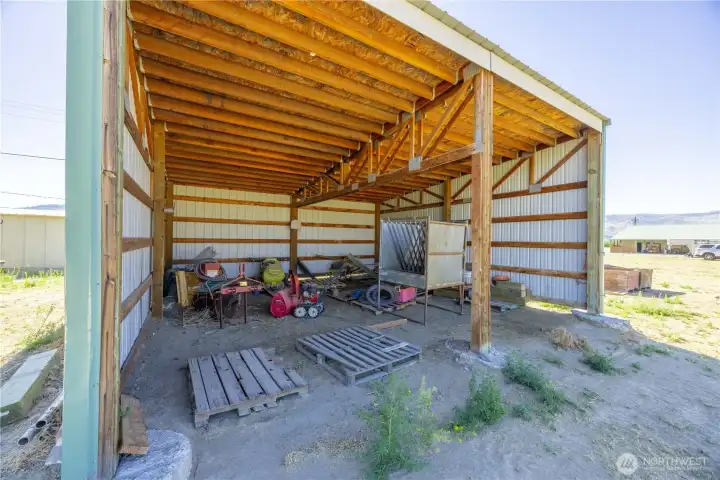 Closeup of the "hay shed", north of the house....house in background.