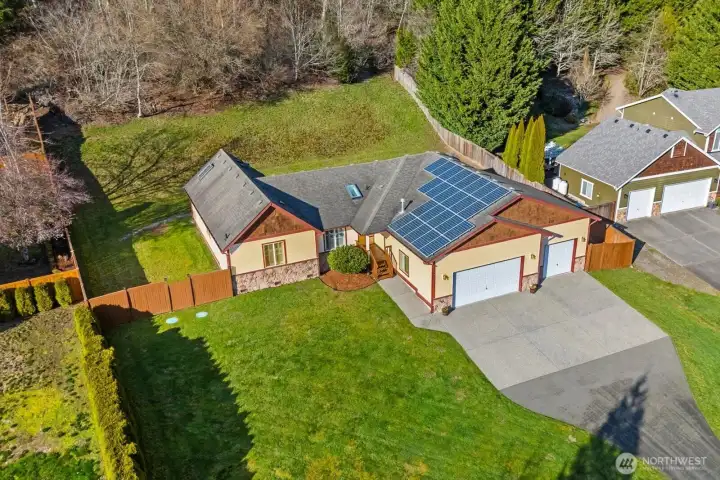 Aerial close in on property from the front
