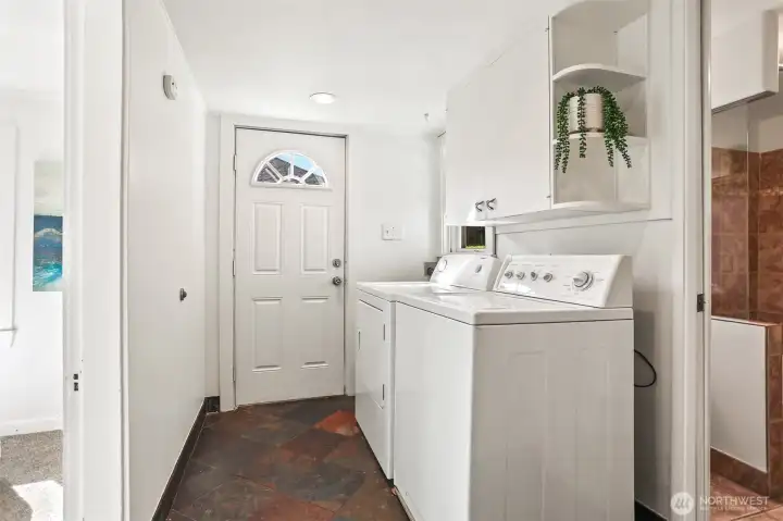 Laundry in the mudroom.  Exit to the garage across the yard.