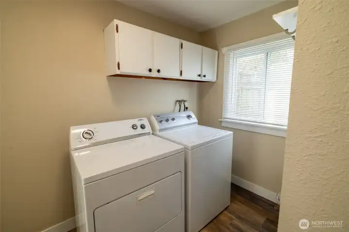 A separate utility room offers space, function, storage, and room.