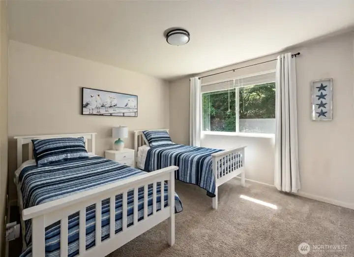 2nd bedroom off the main hall and besides the large 2nd full bathroom