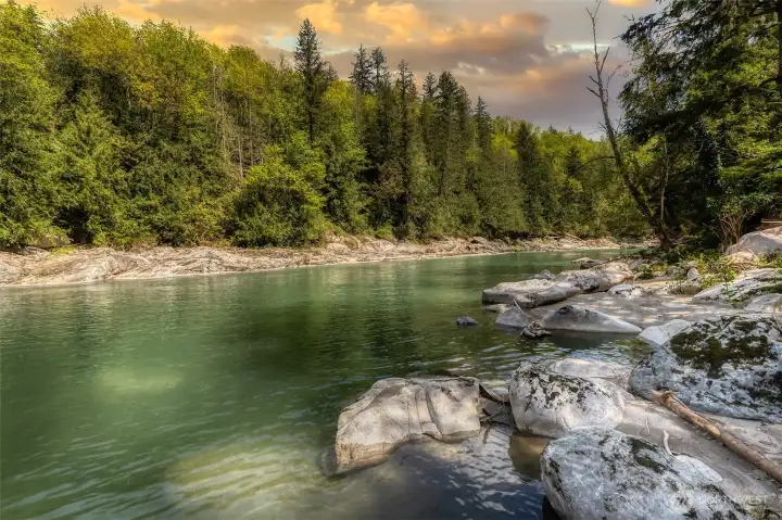From deck to water in minutes ~ you have the rare benefit of calm waters {below the falls}.  Easy access to drop in a raft or kayak right from your own private shoreline.
