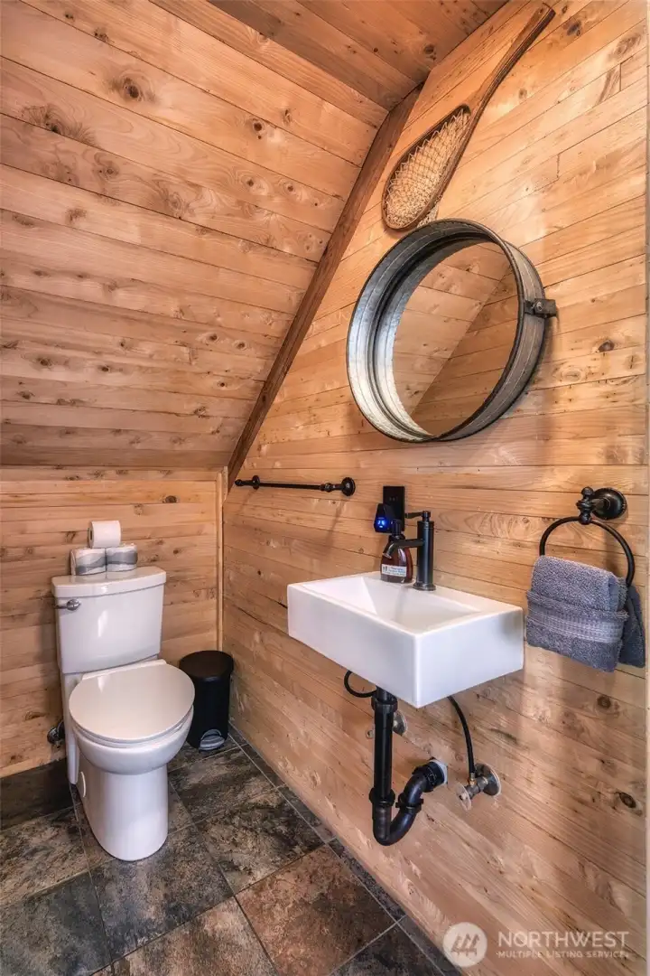 Even the half-bath got a modern makeover to match the soul of the home.