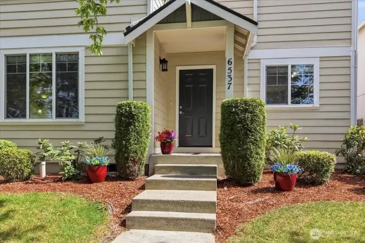 Charming covered front porch Entrance...