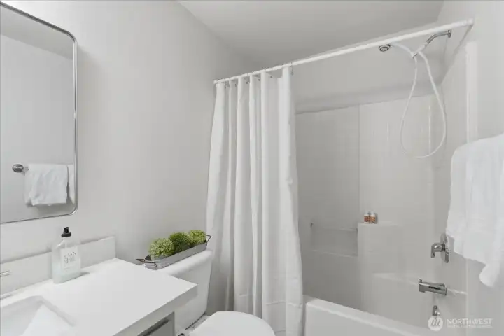 Spacious upstairs shared full bath.