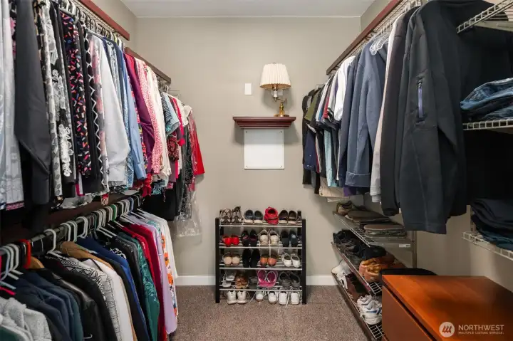 Primary walk-in closet. Primary walk-in closet.
