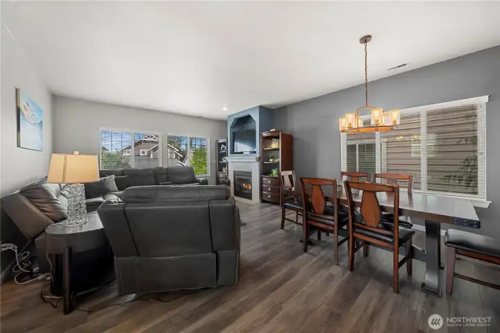 Handsome living and dining rooms with refreshed LVP flooring