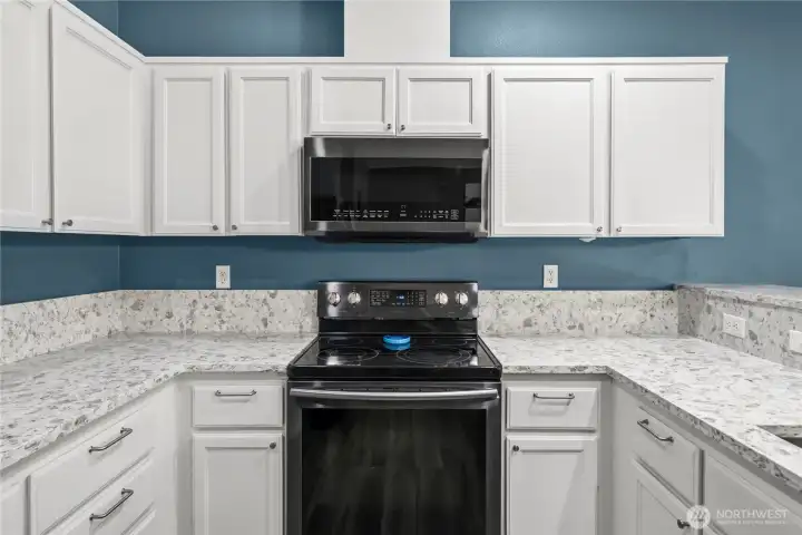 Lots of storage and prep space on the upgraded quartz counters.