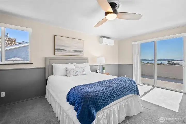 Beautiful primary suite with Air Conditioning, and sliding glass door to the deck. Beautiful primary suite with Air Conditioning, and sliding glass door to the deck.