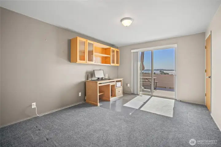 Upstairs second bedroom, which is currently shown as an office Upstairs second bedroom, which is currently shown as an office