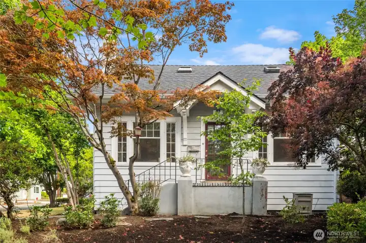 This 1922 charmer is just a few blocks to downtown Ballard. Sited on a large 6400 sq ft corner lot, it offers prime real estate to build a DADU and basement ADU (or use your imagination)!