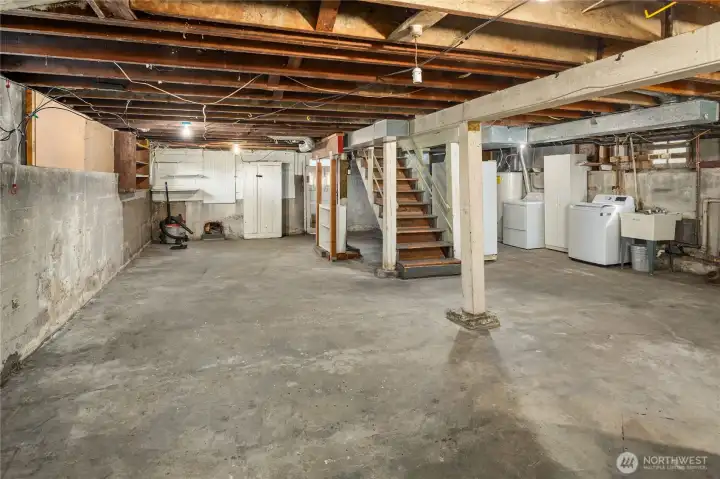 Full length unfinished basement with good ceiling height, ready for your future expansion and remodel.