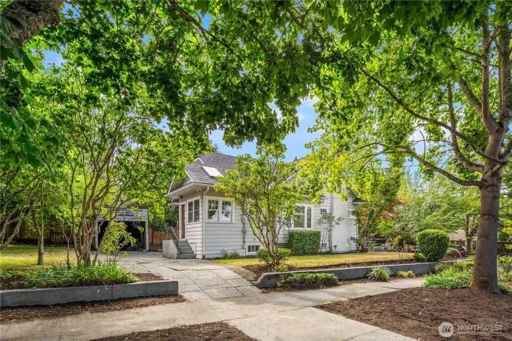 This driveway is off the 9th Ave NW side and offers convenient off-street parking. The back door to the kitchen can be seen here.