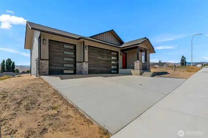 Three car garage with 10 feet tall doors Three car garage with 10 feet tall doors