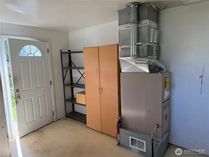 Back door, utility room, furnace Back door, utility room, furnace