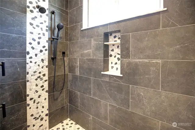 Custom tiled walk in shower.