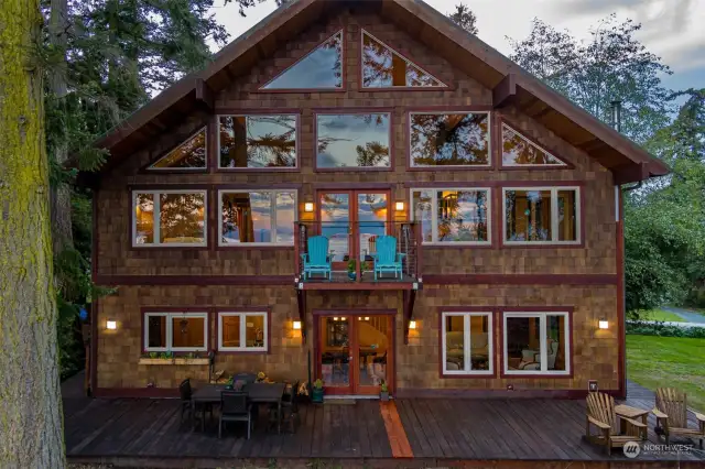 Looking from the water side of the home you can see how incredible the window configuration is.