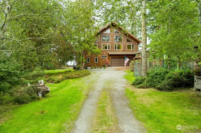 Verdant green beckons you into the property.