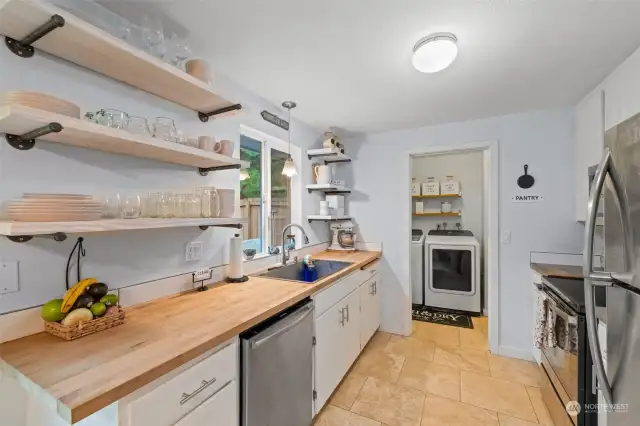 Newer butcher block countertops & microwave.