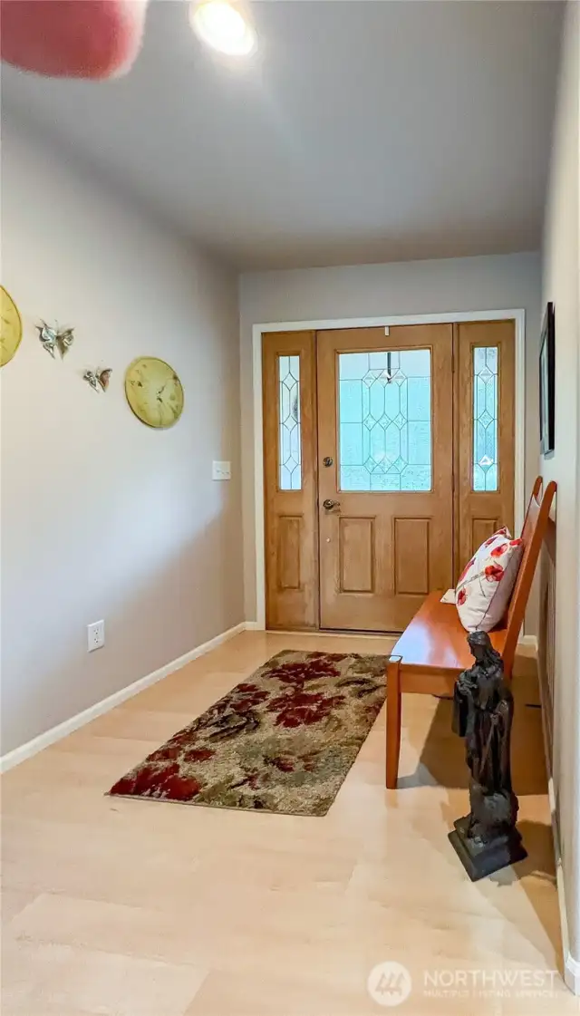 Light and bright entryway into home.