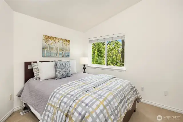 All 3 bedrooms are on the second floor together. Notice the vaulted ceilings.