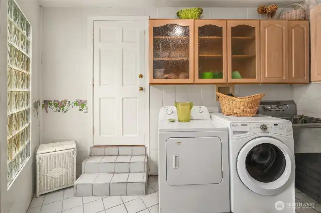 Laundry room on main floor with tons of storage!
