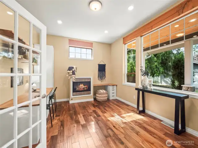 Office w/gas fireplace & French doors, built in desks