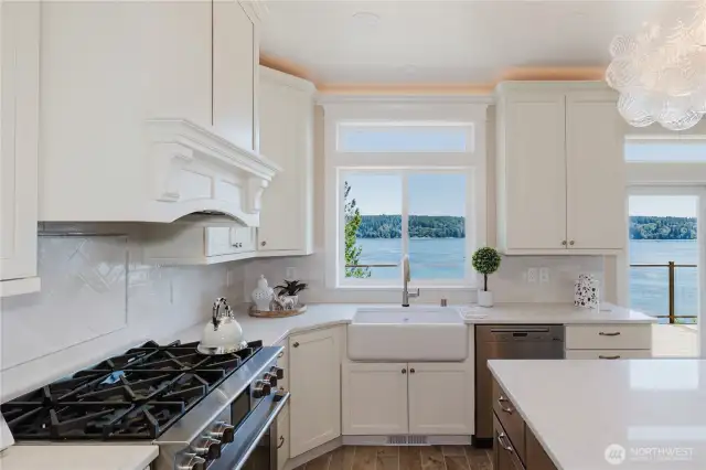 A delight for the master chef, a 6-burner gas stove, farm house sink and touchless Brizo faucet.