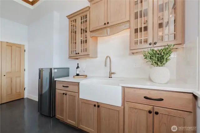 Cherry wood kitchenette in the family/recreation room.