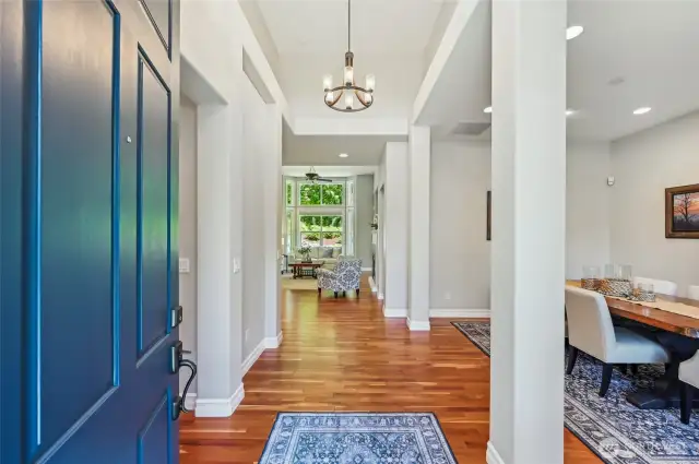 Enter on to cherry hardwood floors that run through the whole home and you look immediately out to the private backyard.