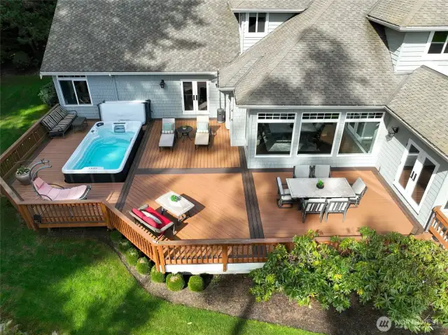 Enjoy Summer BBQ's & swim spa on this entertainment-sized composite deck.