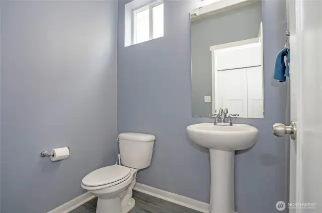 Conveniently located main-level powder room for guests and everyday use.