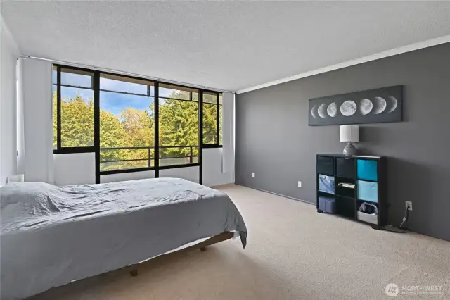 Second view of primary bedroom.