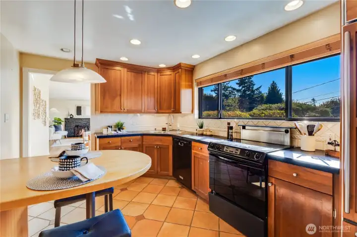 Notice the canned lighting and tile floors. Enjoy the kitchen as it is, or bring your plans to modernize it to your personal taste!