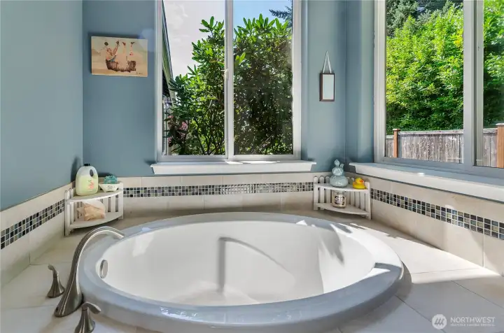 Power-shades provide privacy for soaking tub