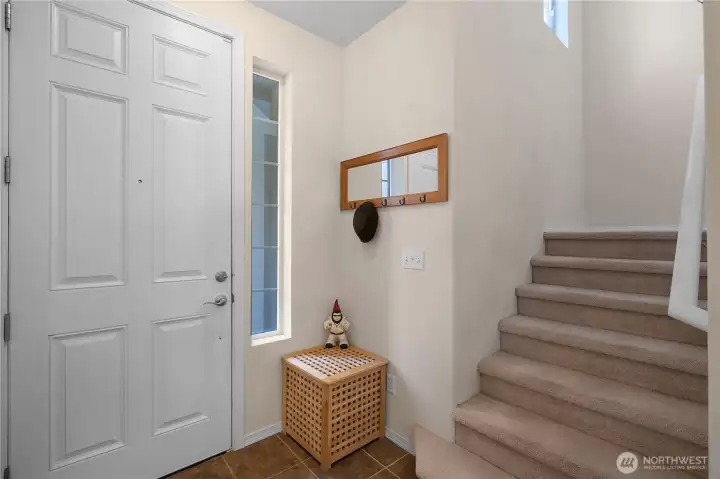 Entrance with ceramic tile.