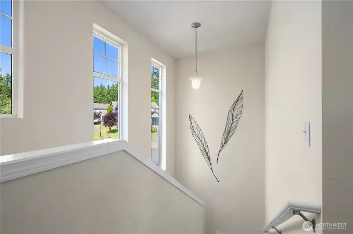 Beautiful bright windows on stairs.