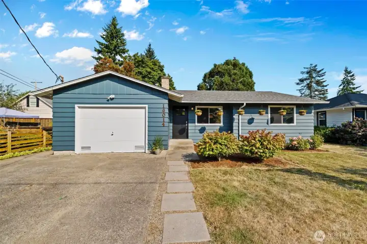 Spacious driveway with oversized garage